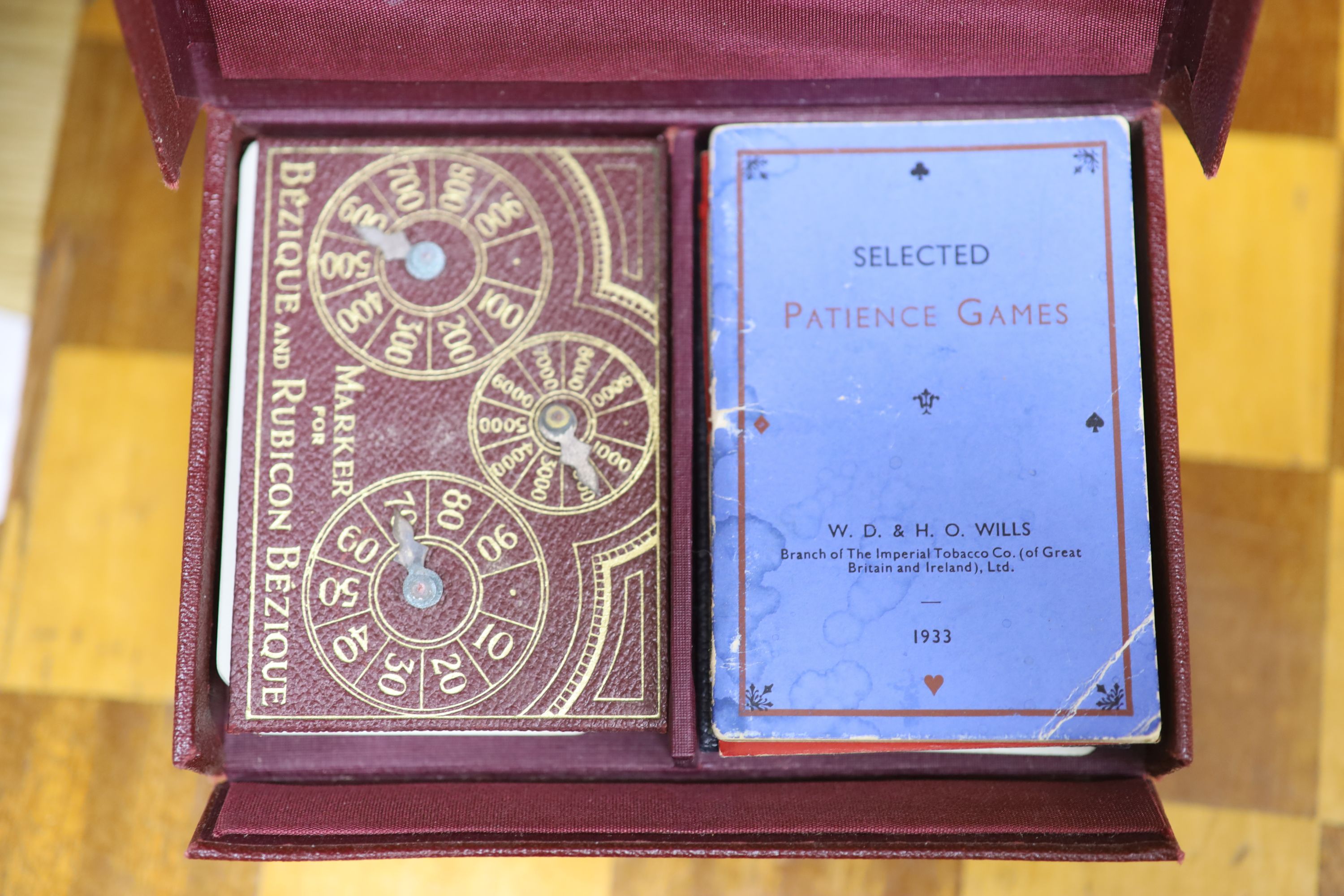 A Staunton style boxwood chess set, a chess board and miscellaneous card games